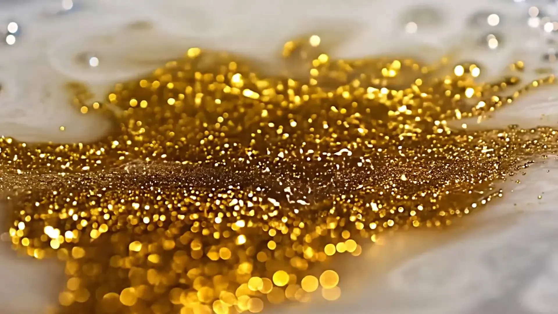 Sparkling Gold Particles Backdrop for Luxury Branding